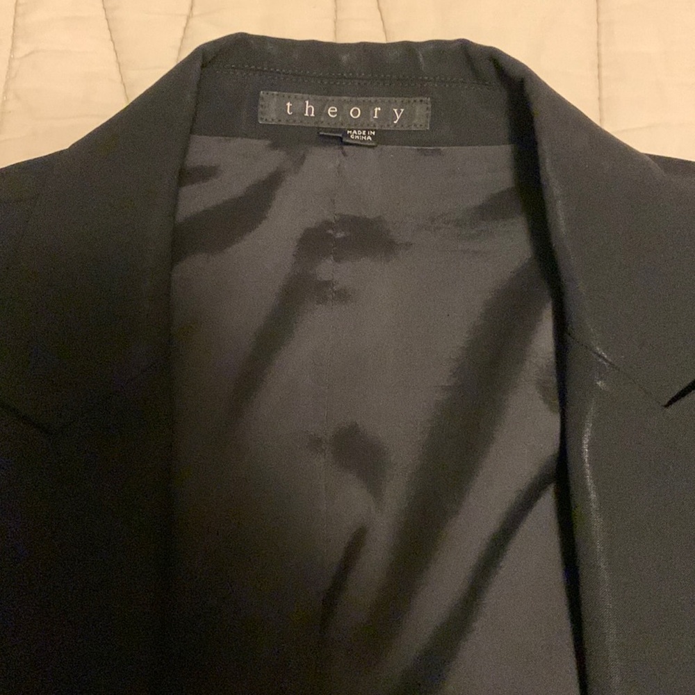Theory black blazer with cream pinstripe lining